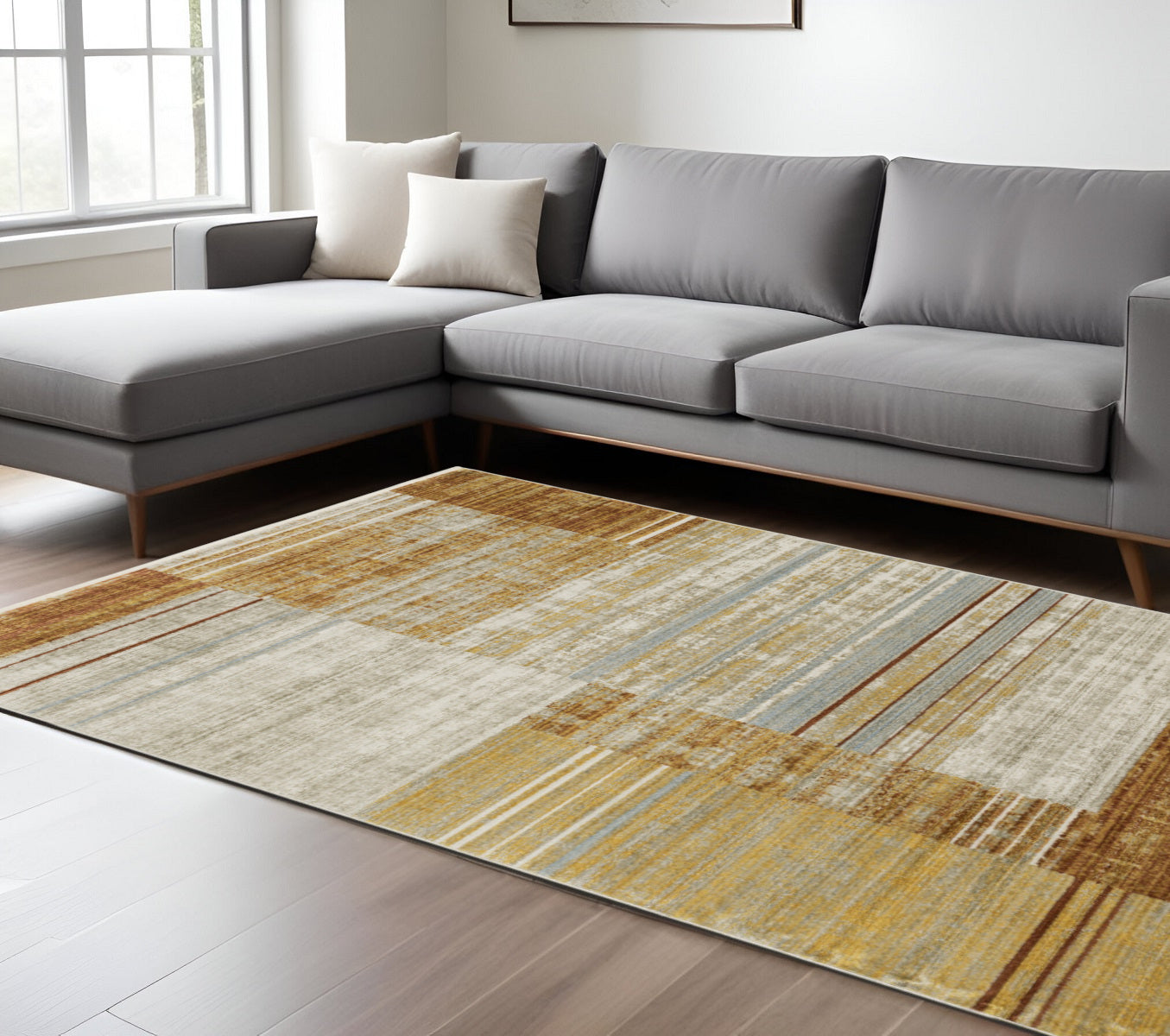 6' X 9' Rust Gold Blue Grey Ivory And Tan Geometric Power Loom Stain Resistant Area Rug With Fringe