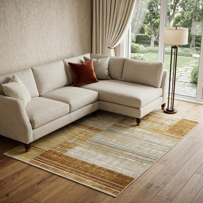 8' X 11' Rust Gold Blue Grey Ivory And Tan Geometric Power Loom Stain Resistant Area Rug With Fringe