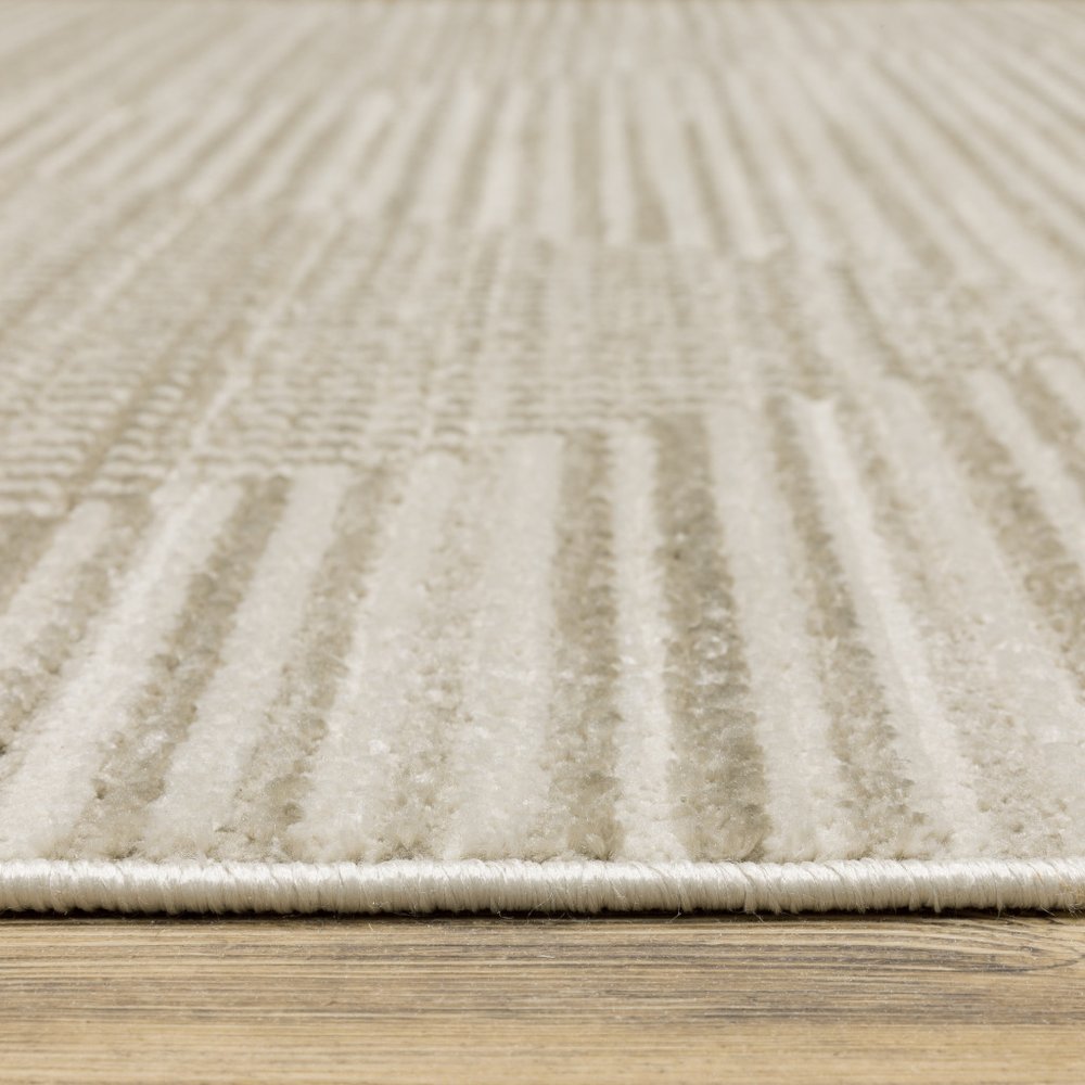 8' Ivory Beige Taupe And Tan Geometric Power Loom Runner Rug With Fringe