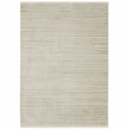 4' X 6' Ivory Beige Taupe And Tan Geometric Power Loom Stain Resistant Area Rug With Fringe