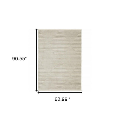 5' x 8' ivory, beige, taupe and tan geometric power loom stain-resistant area rug with fringe