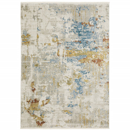 6' X 9' beige grey gold blue rust and teal abstract power loom stain resistant area rug with fringe