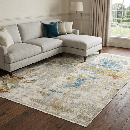 8' X 11' Beige Grey Gold Blue Rust And Teal Abstract Power Loom Stain Resistant Area Rug With Fringe