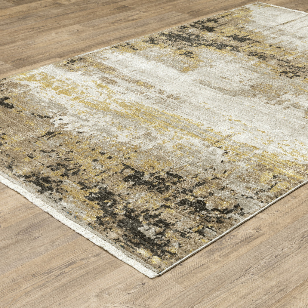 8' X 11' Grey Gold Black Charcoal And Beige Abstract Power Loom Stain Resistant Area Rug With Fringe