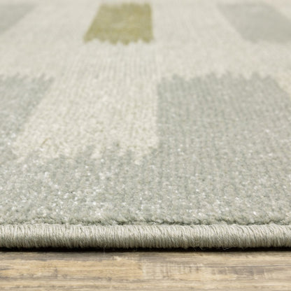 2' X 8' Beige Grey Gold And Green Geometric Power Loom Stain Resistant Runner Rug