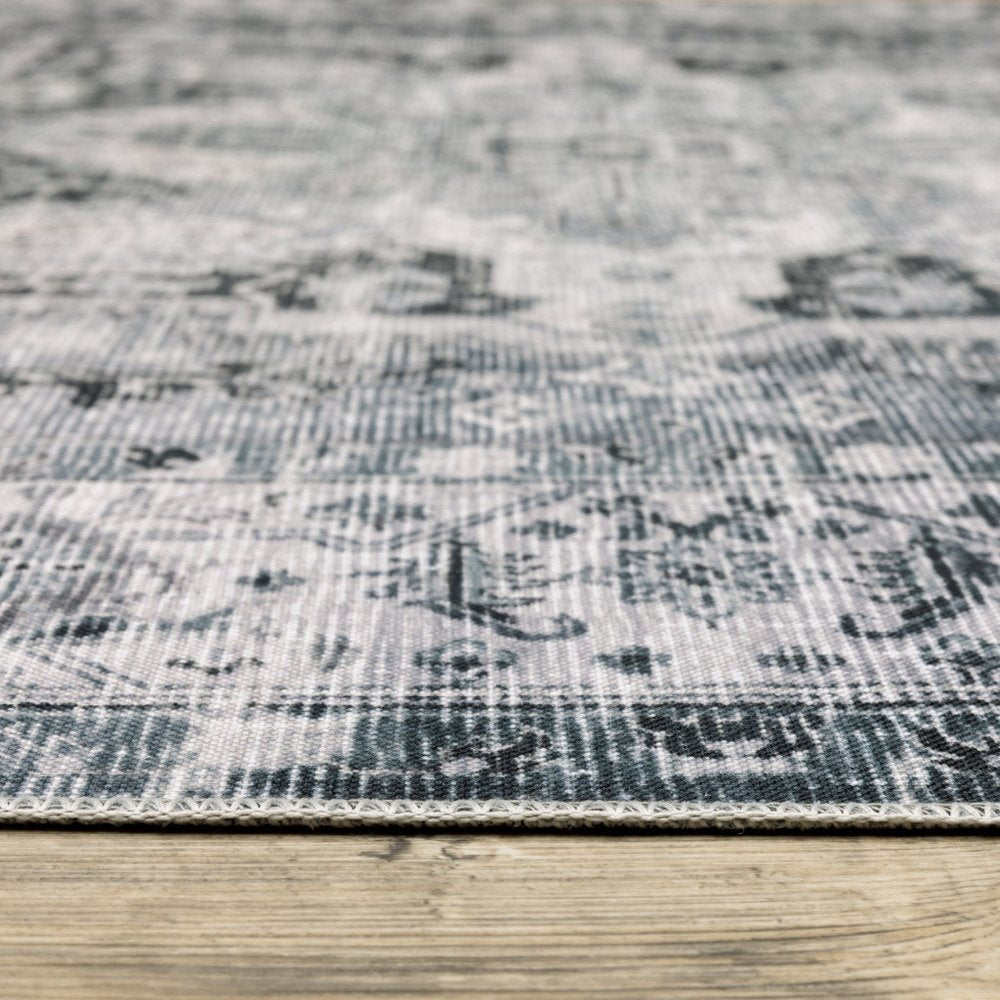 4' X 6' Navy Blue Ivory And Grey Oriental Printed Stain Resistant Non Skid Area Rug