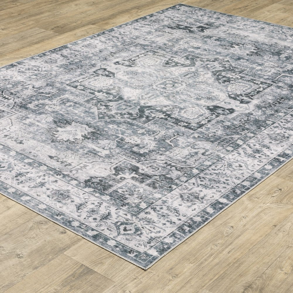 4' X 6' Navy Blue Ivory And Grey Oriental Printed Stain Resistant Non Skid Area Rug