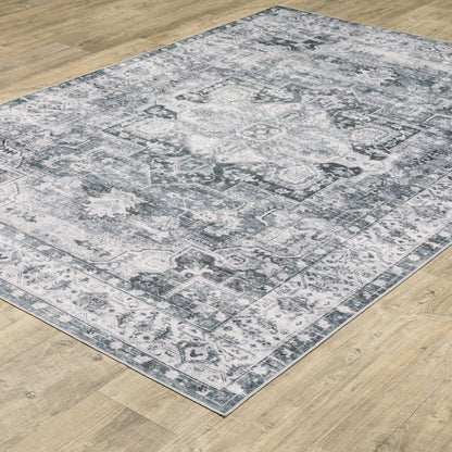 5' X 7' Navy Blue Ivory And Grey Oriental Printed Stain Resistant Non Skid Area Rug