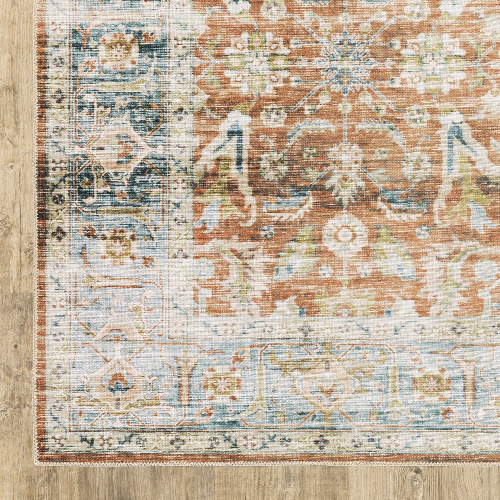 5' X 7' Rust Blue Ivory And Gold Oriental Printed Stain Resistant Non Skid Area Rug