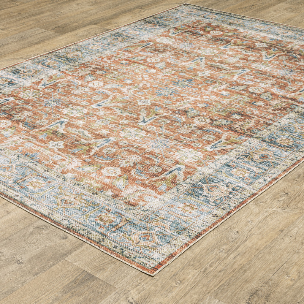 7' X 10' Rust Blue Ivory And Gold Oriental Printed Stain Resistant Non Skid Area Rug