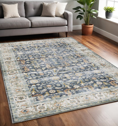 5' X 7' Blue Gold Rust Ivory And Olive Oriental Printed Stain Resistant Non Skid Area Rug
