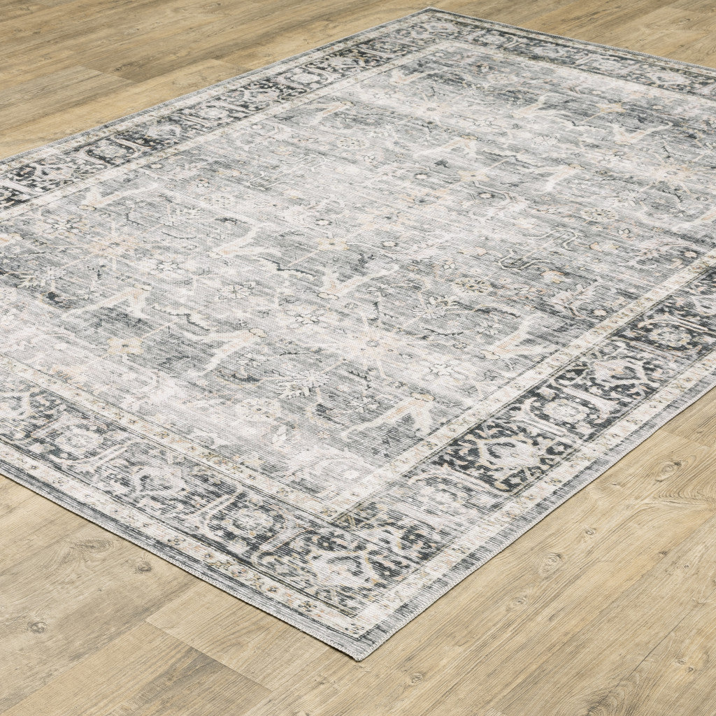 5' X 7' Charcoal Grey Salmon And Ivory Oriental Printed Stain Resistant Non Skid Area Rug