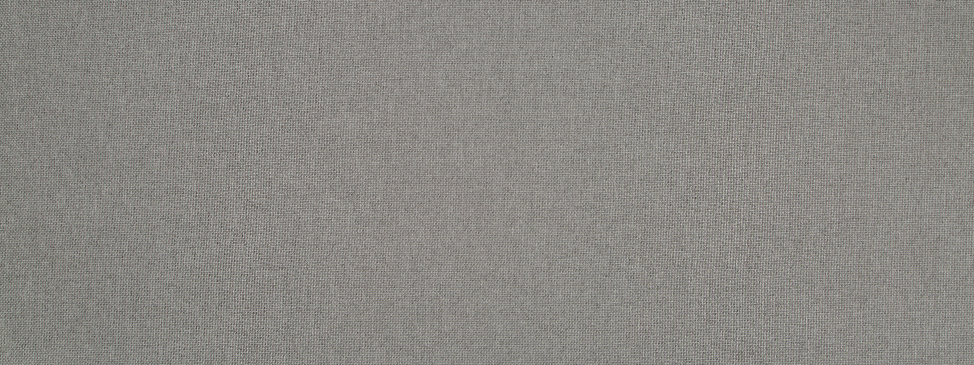 Close-up of light gray textured woven fabric, suitable for upholstery or apparel.