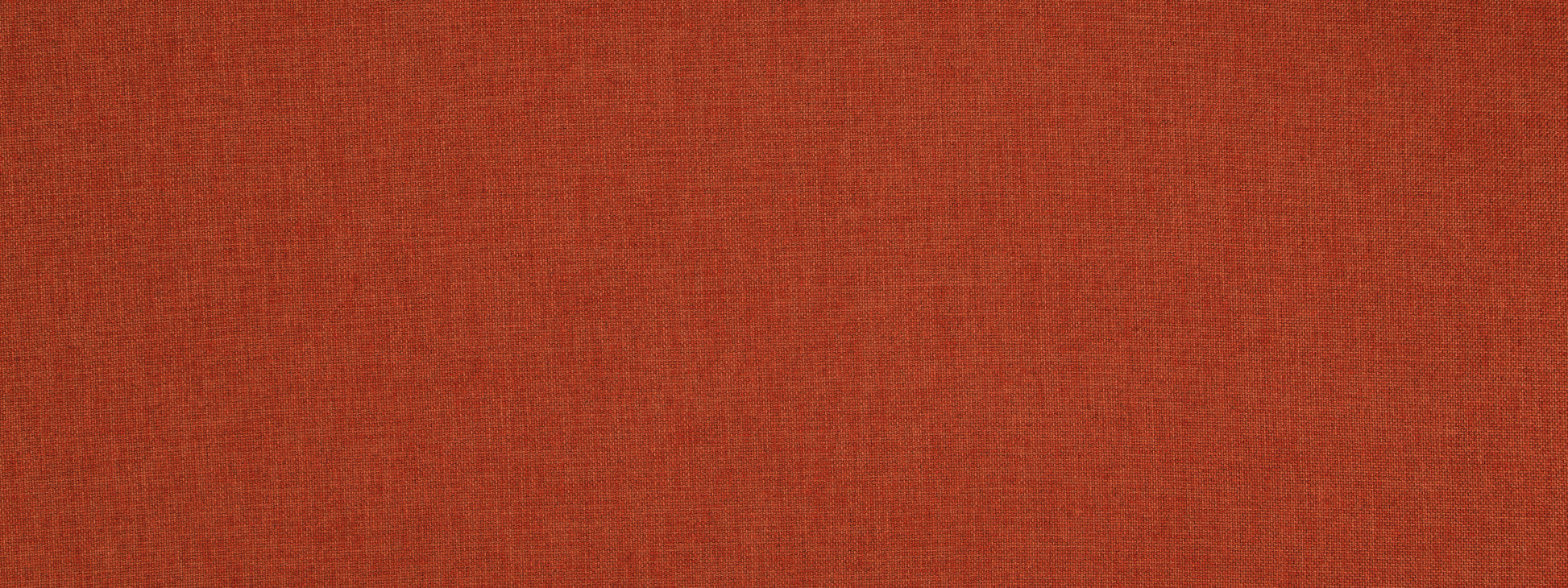 Burnt orange upholstery fabric with a fine weave; soft, versatile fabric for furniture upholstery and home decor.