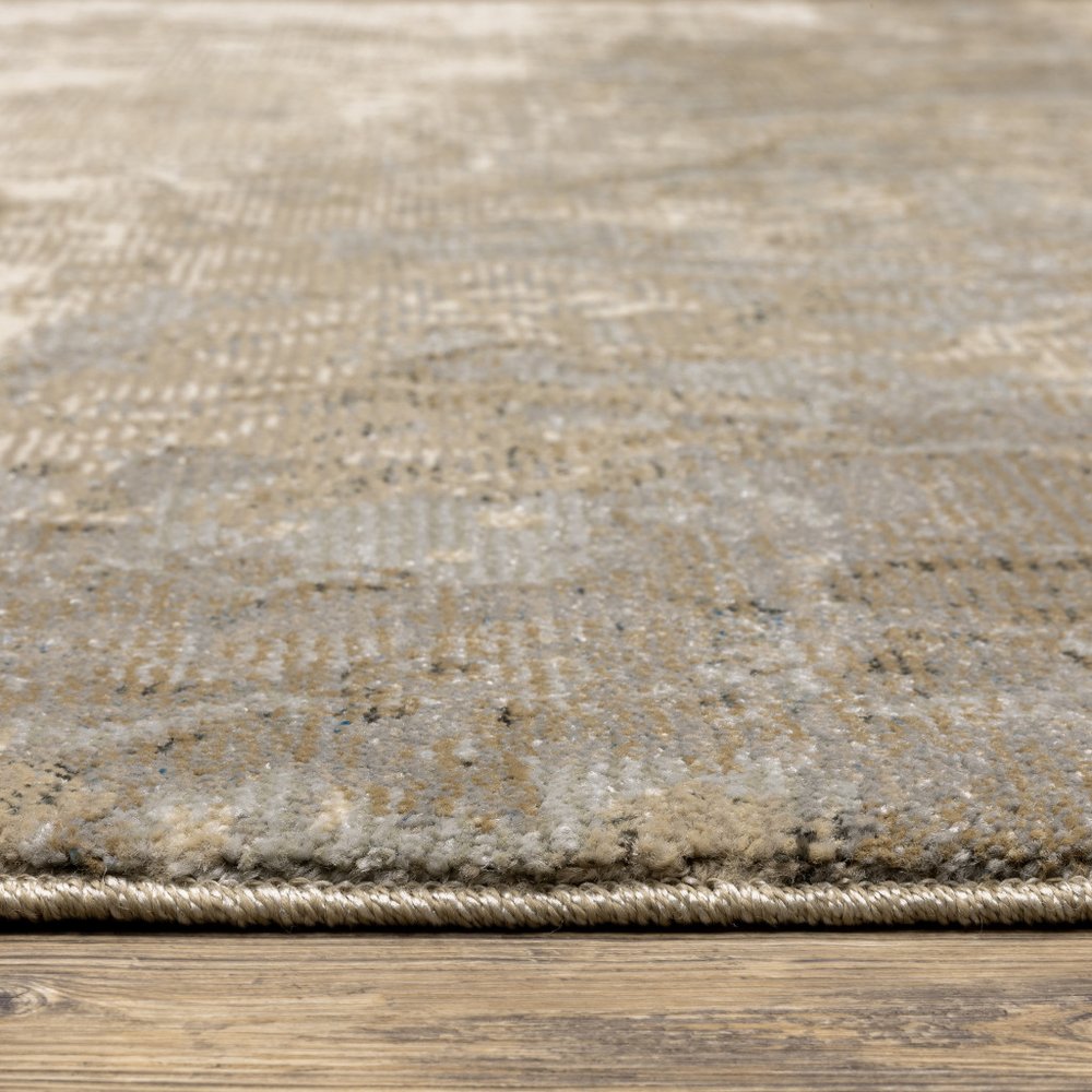 5' X 7' Gray and Ivory Abstract Power Loom Area Rug