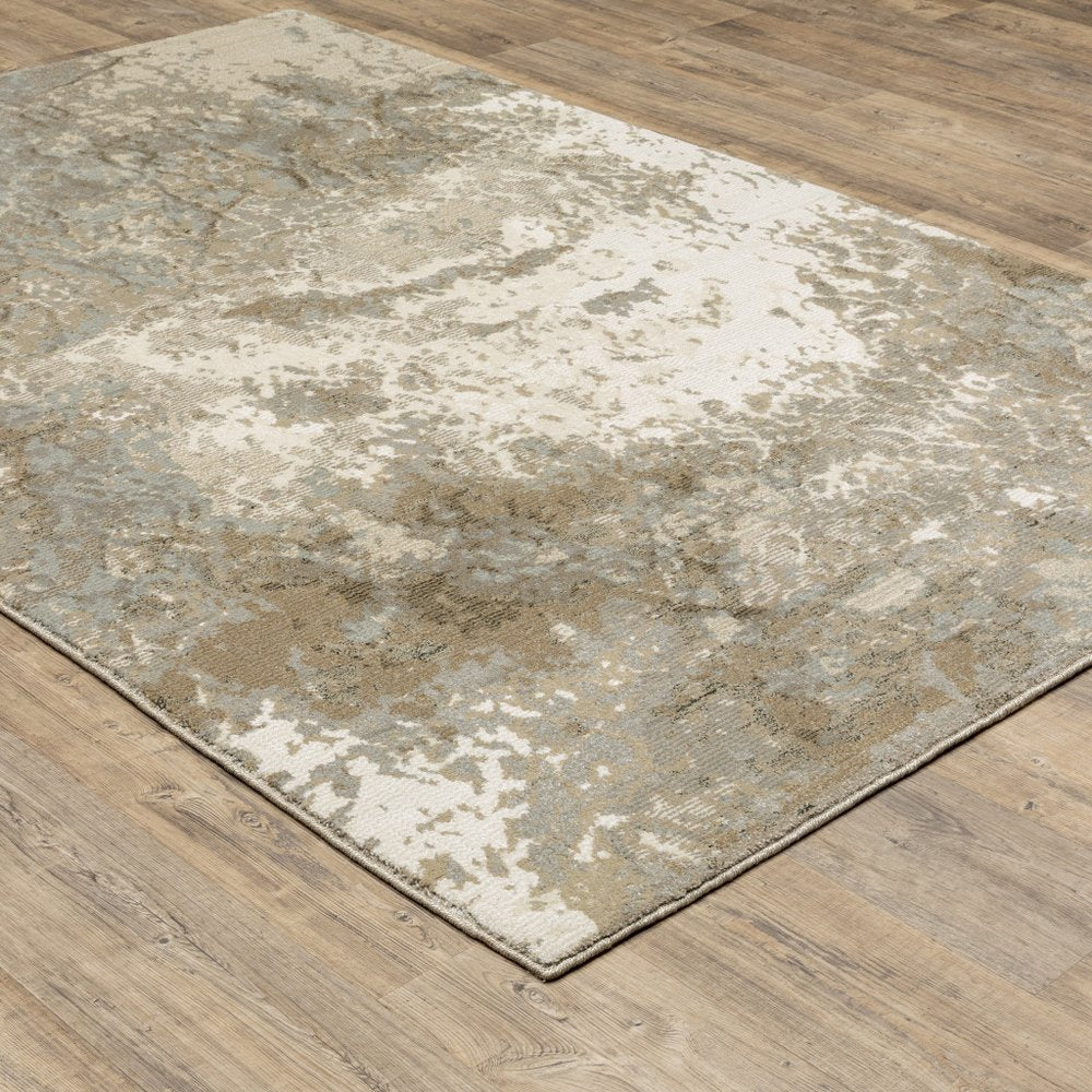7' X 10' Gray and Ivory Abstract Power Loom Area Rug