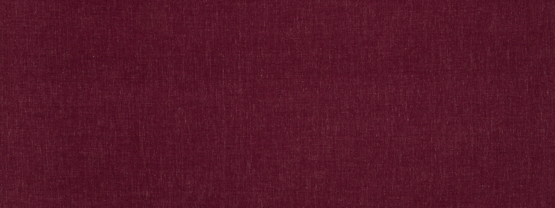 Close-up of deep burgundy fabric with subtle woven texture.