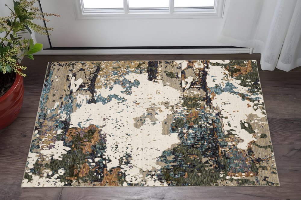 3' X 5' Blue and Ivory Abstract Power Loom Area Rug