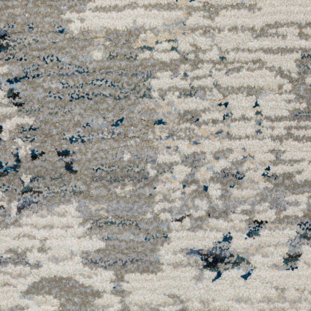 5' x 7' Blue and Beige Abstract Power Loom Area Rug