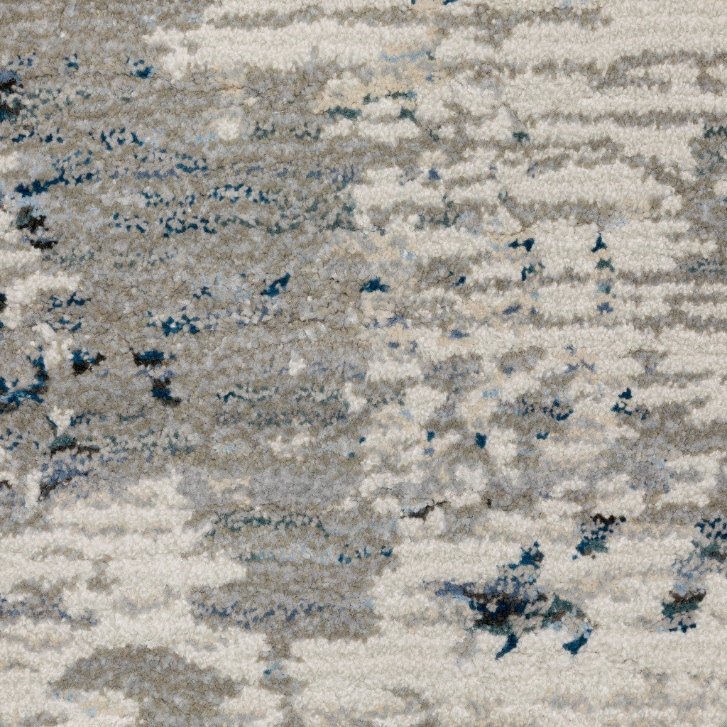 7' X 10' Blue and Beige Abstract Power Loom Area Rug