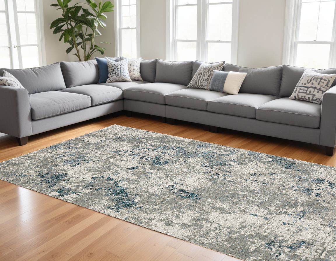 8' X 11' Blue and Beige Abstract Power Loom Area Rug