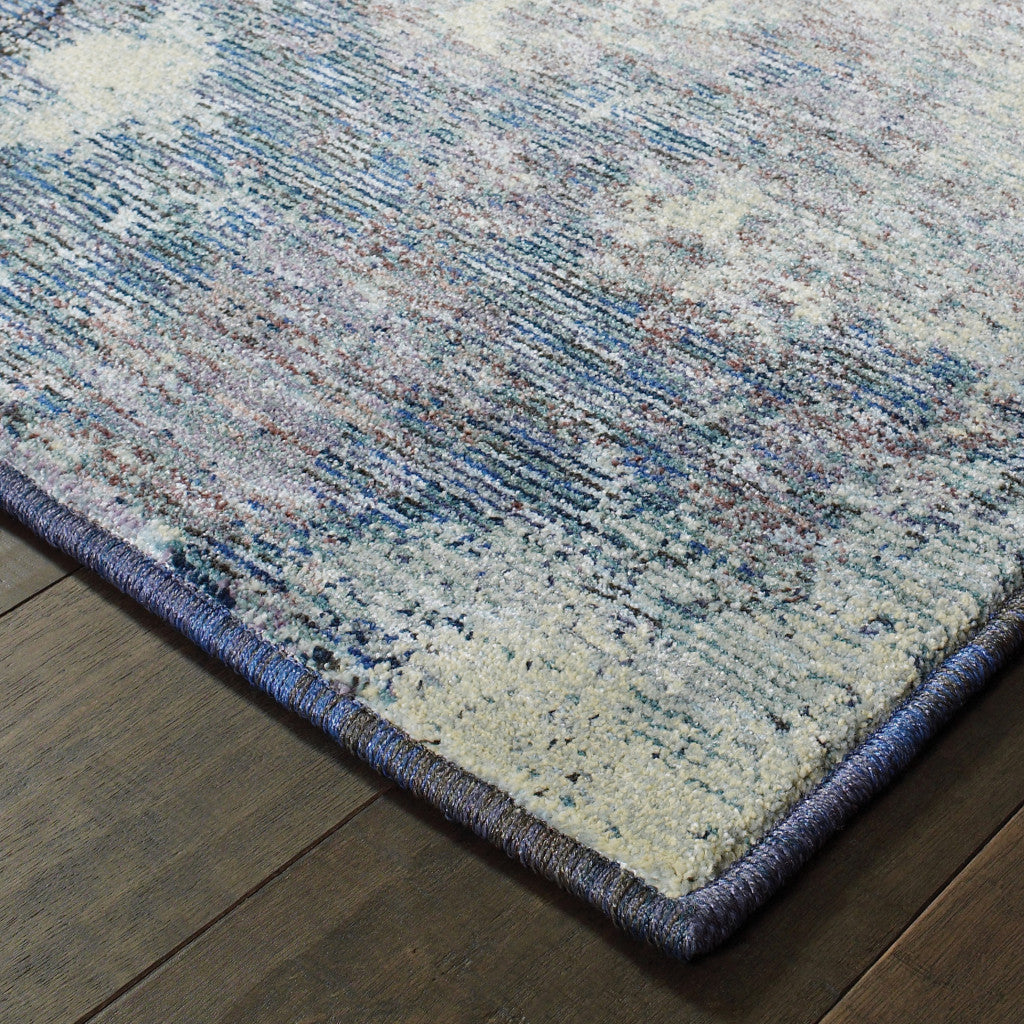 10' X 13' Blue and Ivory Abstract Power Loom Area Rug