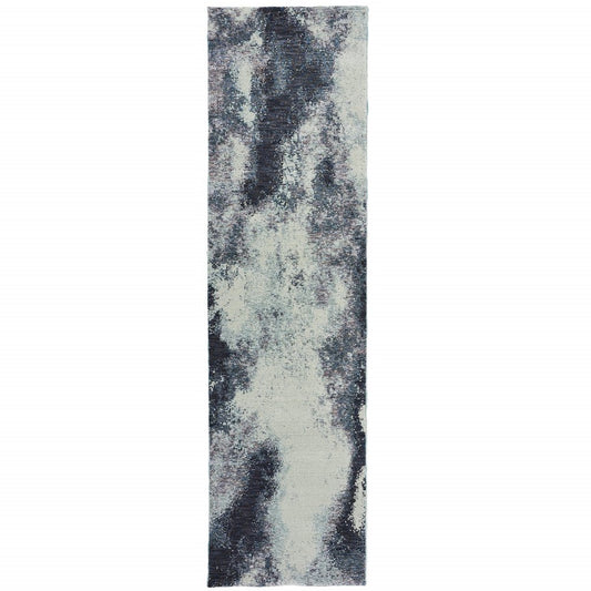 Ivory abstract runner rug with a cloud-like pattern, rectangular & modern style.