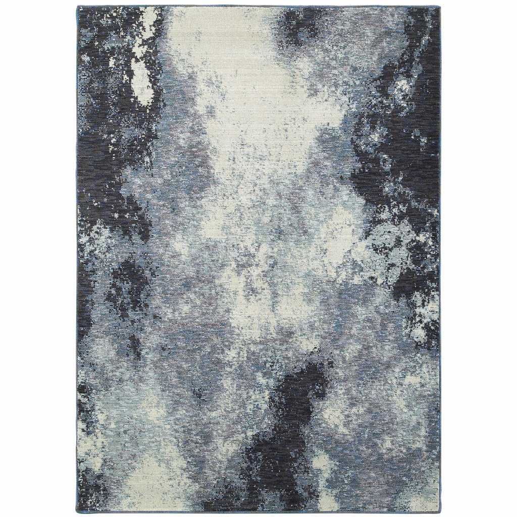 5' x 7' Blue and Ivory Abstract Power Loom Area Rug