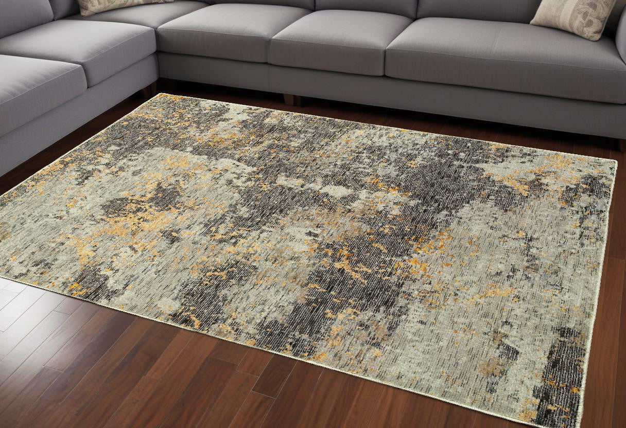 7' X 10' Gray and Ivory Abstract Power Loom Area Rug