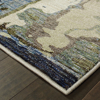 Abstract blue and gray runner rug with cream and tan accents; beige binding edge on dark wood floor.