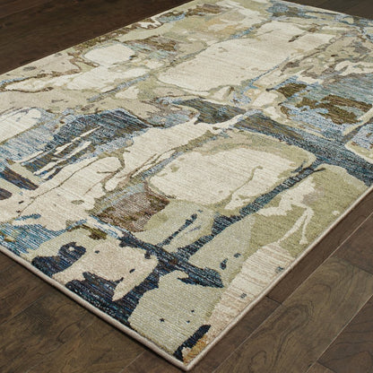 8' x 11' blue and gray abstract power loom area rug.