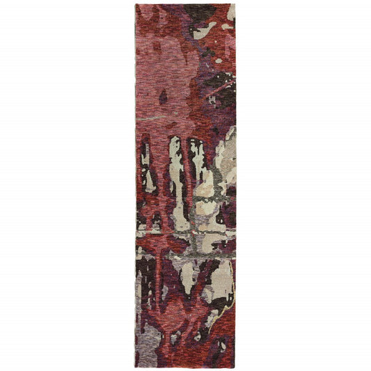 Vertical runner rug in abstract patchwork of red, burgundy, cream, beige and plum; modern, narrow hallway accent.