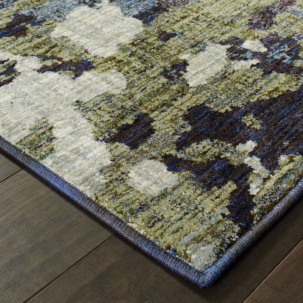12' long green abstract runner rug.