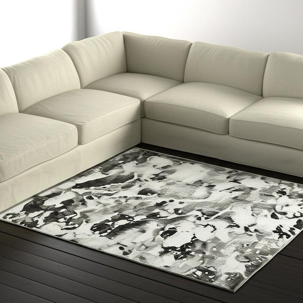 7' X 10' Gray and White Abstract Power Loom Area Rug