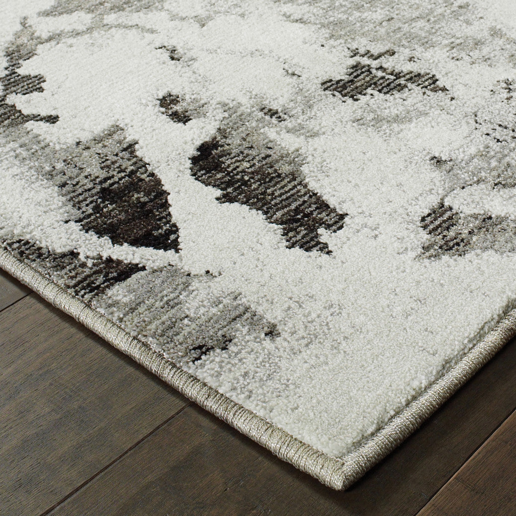 9' x 12' Gray and White Abstract Power Loom Area Rug