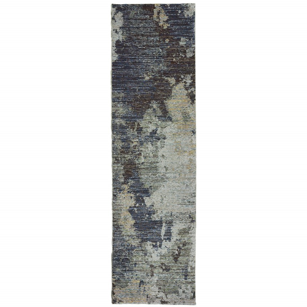Abstract distressed blue-gray runner rug with beige patches, modern décor style.