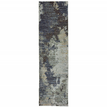 Abstract distressed blue-gray runner rug with beige patches, modern décor style.
