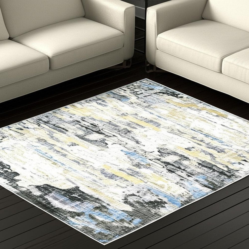 5' X 7' Gray And Ivory Abstract Printed Stain Resistant Non Skid Area Rug