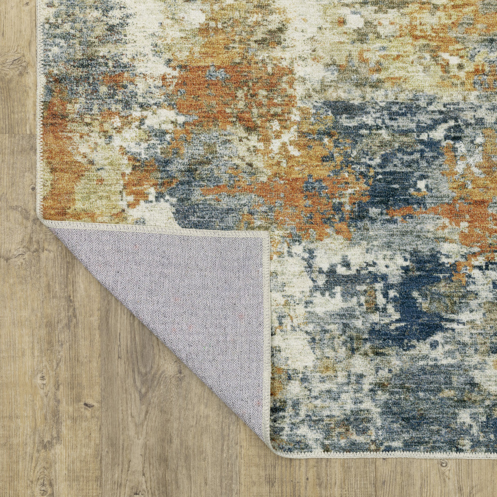 2' X 3' Teal Blue Orange Gold Grey Tan Brown And Beige Abstract Printed Stain Resistant Non Skid Area Rug