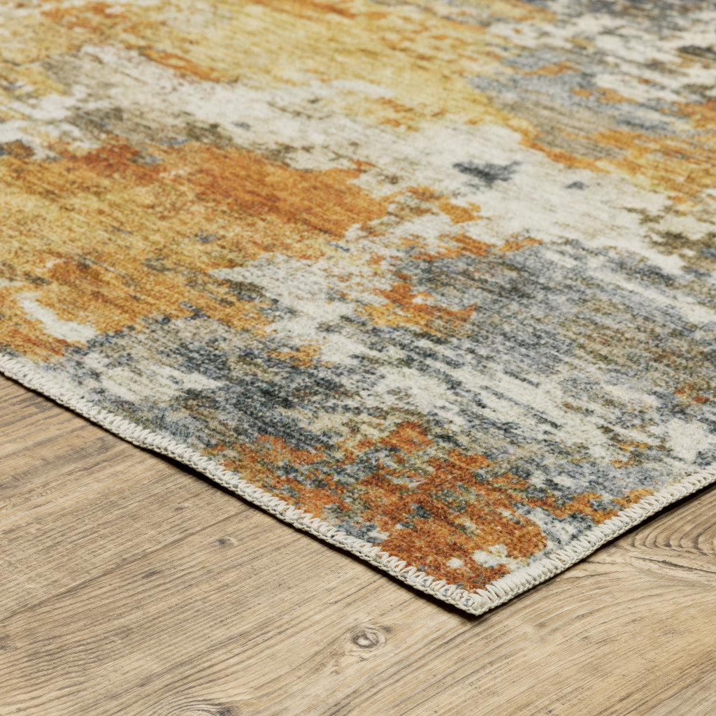 5' X 7' Teal Blue Orange Gold Grey Tan Brown And Beige Abstract Printed Stain Resistant Non Skid Area Rug