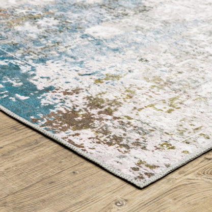2' X 3' Ivory And Blue Abstract Printed Stain Resistant Non Skid Area Rug
