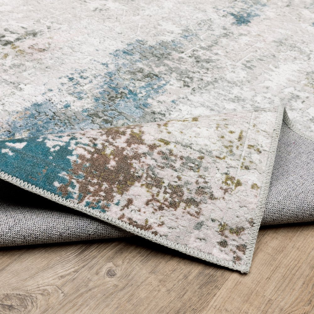 2' X 8' Ivory And Blue Abstract Printed Stain Resistant Non Skid Runner Rug