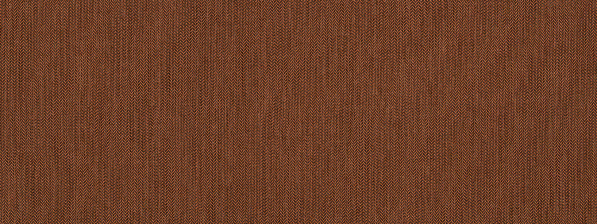 Close-up of rust-colored upholstery fabric with a grooved texture and matte finish.