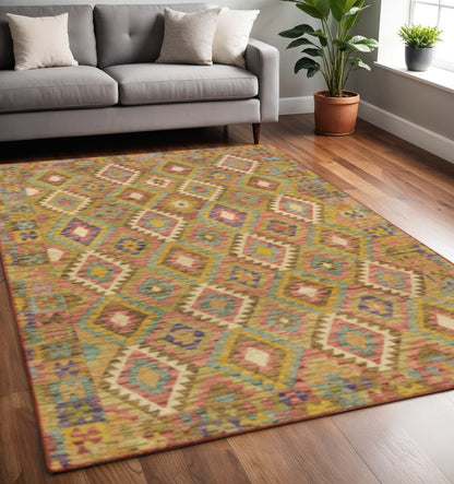5' X 7' Gold Orange Brown Red Green Purple And Beige Southwestern Printed Stain Resistant Non Skid Area Rug