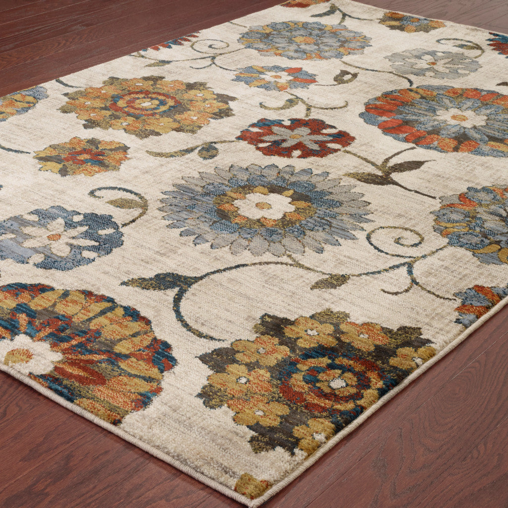 6' X 9' Ivory Blue Gold Green Orange Rust And Teal Floral Power Loom Stain Resistant Area Rug
