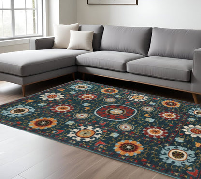 10' X 13' Teal Blue Rust Gold And Ivory Floral Power Loom Stain Resistant Area Rug
