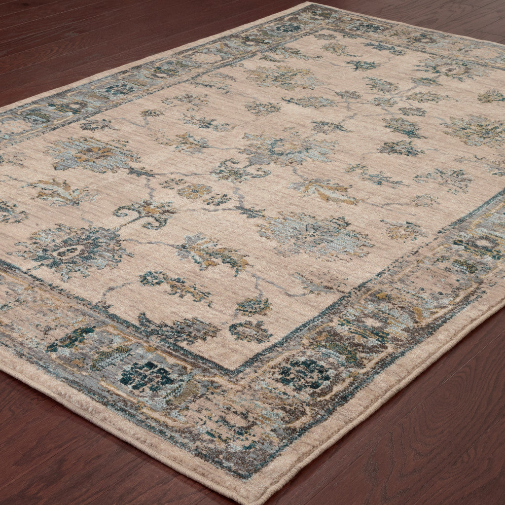 5' X 8' Ivory Blue Gold And Grey Oriental Power Loom Stain Resistant Area Rug