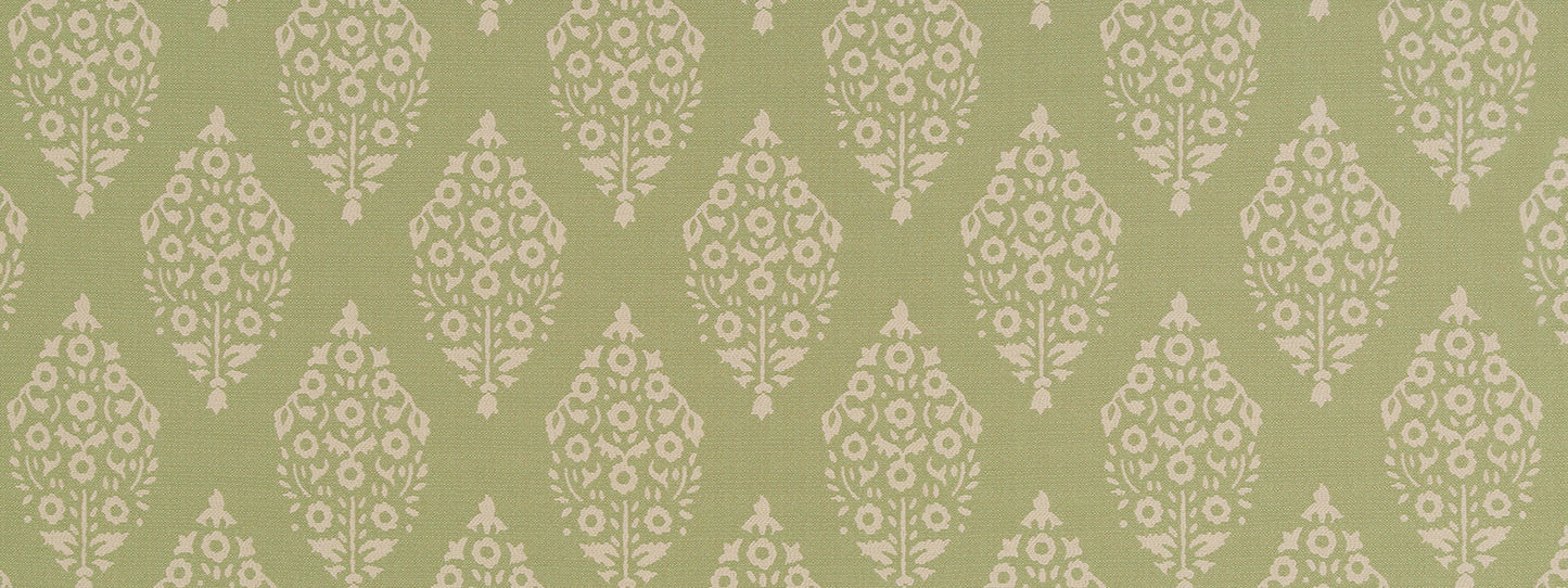 Olive green upholstery fabric with repeating ivory damask floral motifs in a vintage decorative pattern.