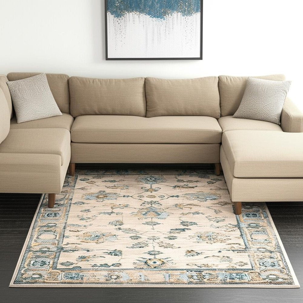 10' X 13' Ivory Blue Gold And Grey Oriental Power Loom Stain Resistant Area Rug