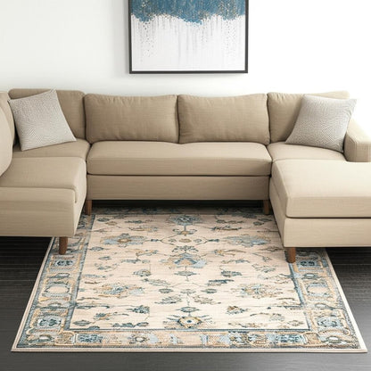 10' X 13' Ivory Blue Gold And Grey Oriental Power Loom Stain Resistant Area Rug